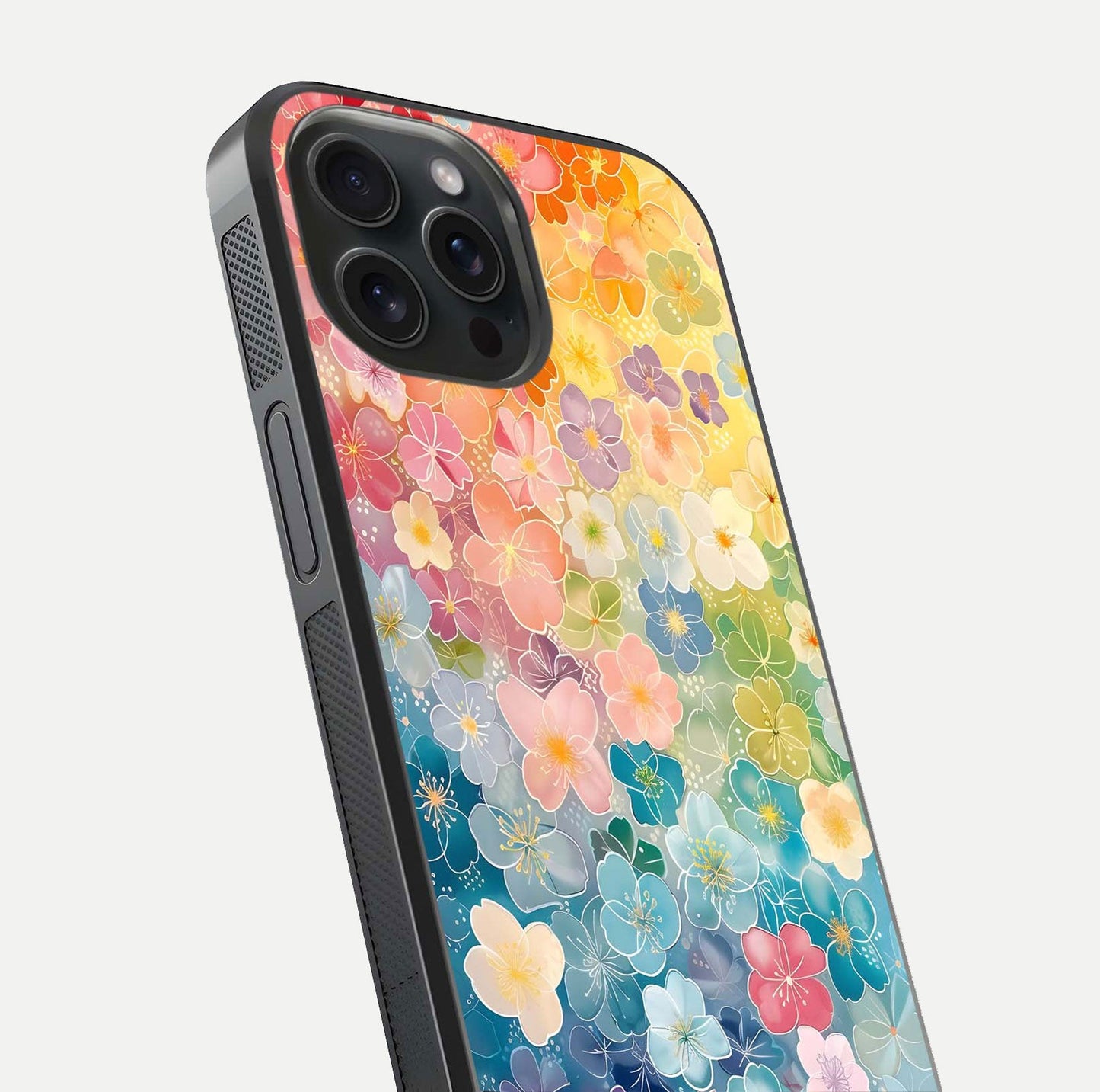 Rainbow Blossom Burst Glass Case for iPhone 15 Pro close-up angled shot showing petal colors and reflection