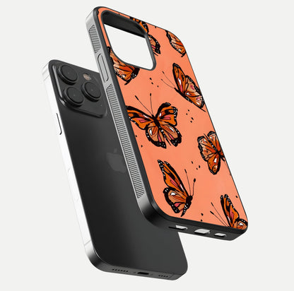 Coral Wing Butterfly Glass Case for iPhone 15 Pro floating mockup showing HD gloss texture and vivid coral color