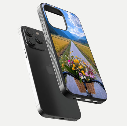 Golden Field Journey Glass Case for iPhone 15 Pro floating dual-view mockup showing gloss surface and field depth