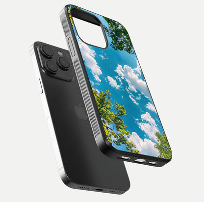 Greenery Sky Glass Case for iPhone 15 Pro floating dual-view mockup showing glossy shine and soft natural tones