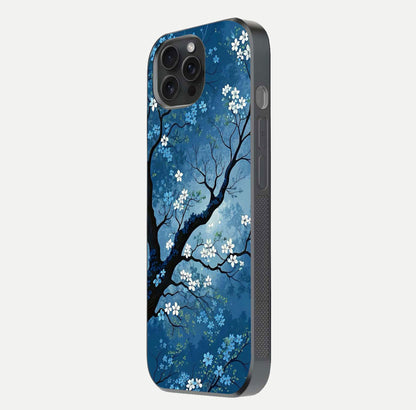 Blue Tree Serenity Glass Case for iPhone 15 Pro side-angle shot showing glossy edge and tree pattern reflection