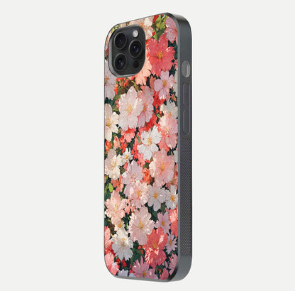 Blush Bloom Field Glass Case for iPhone 15 Pro side-angle image showing petal pattern gloss and smooth edges