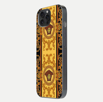 Golden Royal Heritage Glass Case for iPhone 15 Pro side-angle image showing reflection glow and luxury detailing