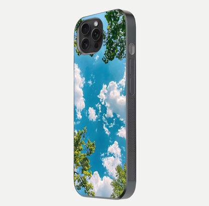 Greenery Sky Glass Case for iPhone 15 Pro side-angle image showing reflection glow and nature-themed pattern