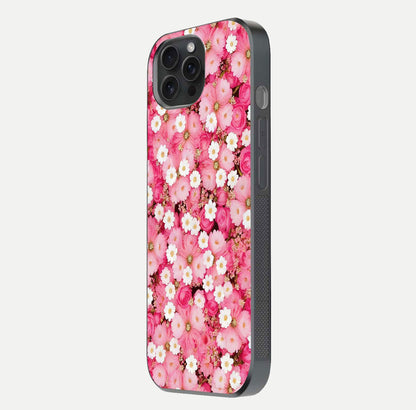 Pink Daisy Bliss Glass Case for iPhone 15 Pro side-angle image showing delicate daisy pattern and glass reflection