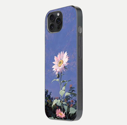 Pink Sunflower Glow Glass Case for iPhone 15 Pro side-angle image showing glossy edges and vivid sunflower tones
