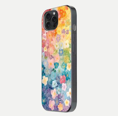 Rainbow Blossom Burst Glass Case for iPhone 15 Pro side-angle image showing reflection and floral burst detail