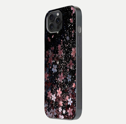 Starlit Flower Dreams Glass Case for iPhone 15 Pro side-angle image showing shine, edge detail, and floral contrast