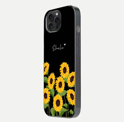 Sunflower Chic Mood Custom Name Glass Case for iPhone 15 Pro side-angle image showing reflection and yellow floral tone