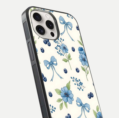 Blue Flower & Bow Glass Case for iPhone 15 Pro Max close-up shot highlighting ribbon detail and flower gloss finish