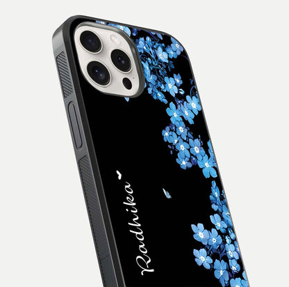 Blue Petal Dream Custom Name Glass Case for iPhone 15 Pro Max close-up highlighting petal texture and gloss reflection