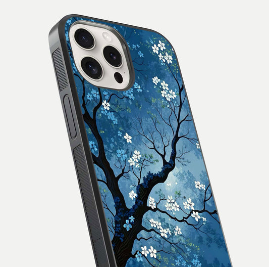 Blue Tree Serenity Glass Case for iPhone 15 Pro Max close-up view highlighting tree branches and reflection gloss