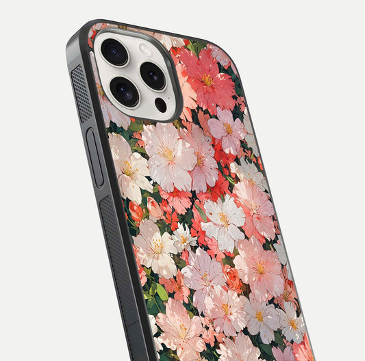Blush Bloom Field Glass Case for iPhone 15 Pro Max close-up shot capturing pastel flower field tones and gloss shine