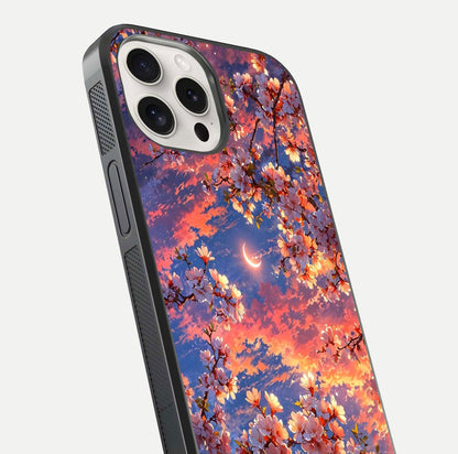 Celestial Sakura Sunset Glass Case for iPhone 15 Pro Max close-up image highlighting blossom petals and gloss shine