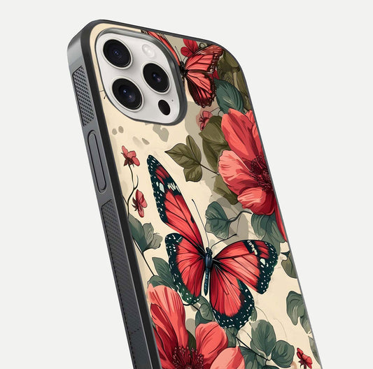 Crimson Butterfly Garden Glass Case for iPhone 15 Pro Max close-up showing wing detail and reflection shine