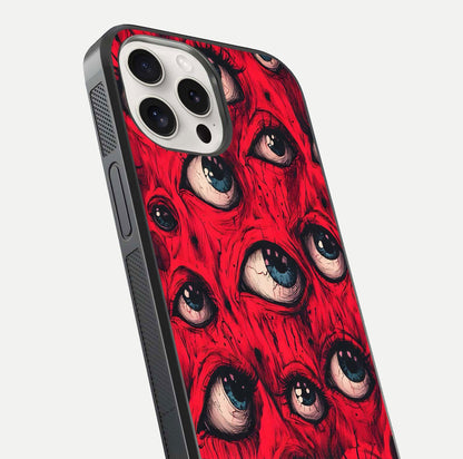 Crimson Watch Eyes Glass Case for iPhone 15 Pro Max close-up highlighting graphic detail and reflection