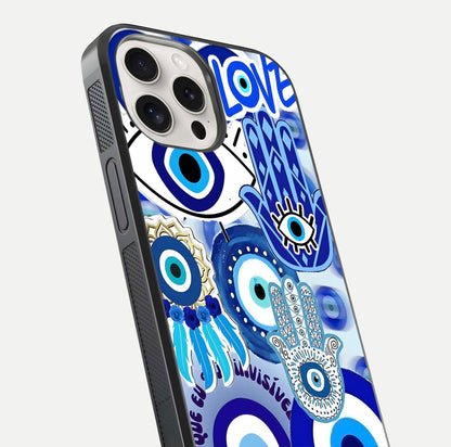 Evil Eyes Dream Glass Case for iPhone 15 Pro Max close-up highlighting evil-eye charm detail and light reflection on glass