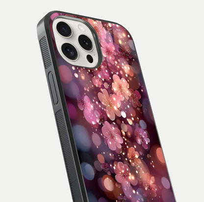 Glowing Petal Bliss Glass Case for iPhone 15 Pro Max close-up angled shot showing petal glow, color depth, and reflection shine