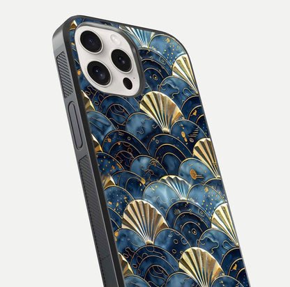 Golden Wave Luxe Glass Case for iPhone 15 Pro Max close-up angled shot showing flowing wave texture and reflection brightness