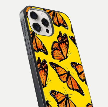 Golden Wing Flight Glass Case for iPhone 15 Pro Max close-up angled shot showing metallic wing texture and shine detail