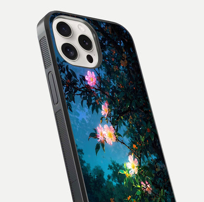 Midnight Bloom Glow Glass Case for iPhone 15 Pro Max close-up angled shot showing petal highlights and glow reflection