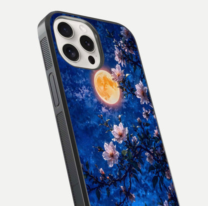 Moonlit Blossoms Night Glass Case for iPhone 15 Pro Max close-up angled shot showing petal glow and reflection detail