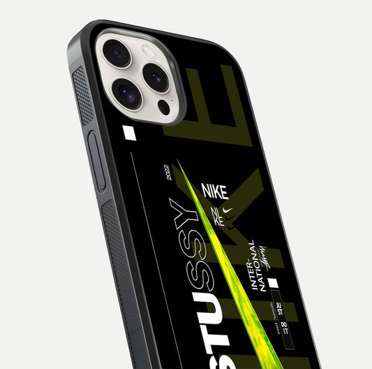 Neon Street Edition Glass Case for iPhone 15 Pro Max close-up angled shot showing urban neon lights and shine