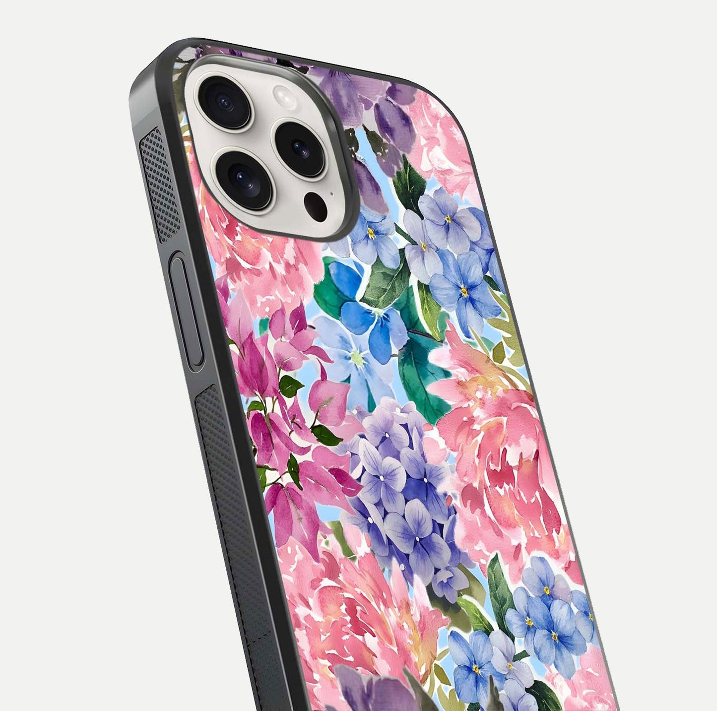 Pastel Floral Mix Glass Case for iPhone 15 Pro Max close-up angled shot highlighting flower detail and reflection