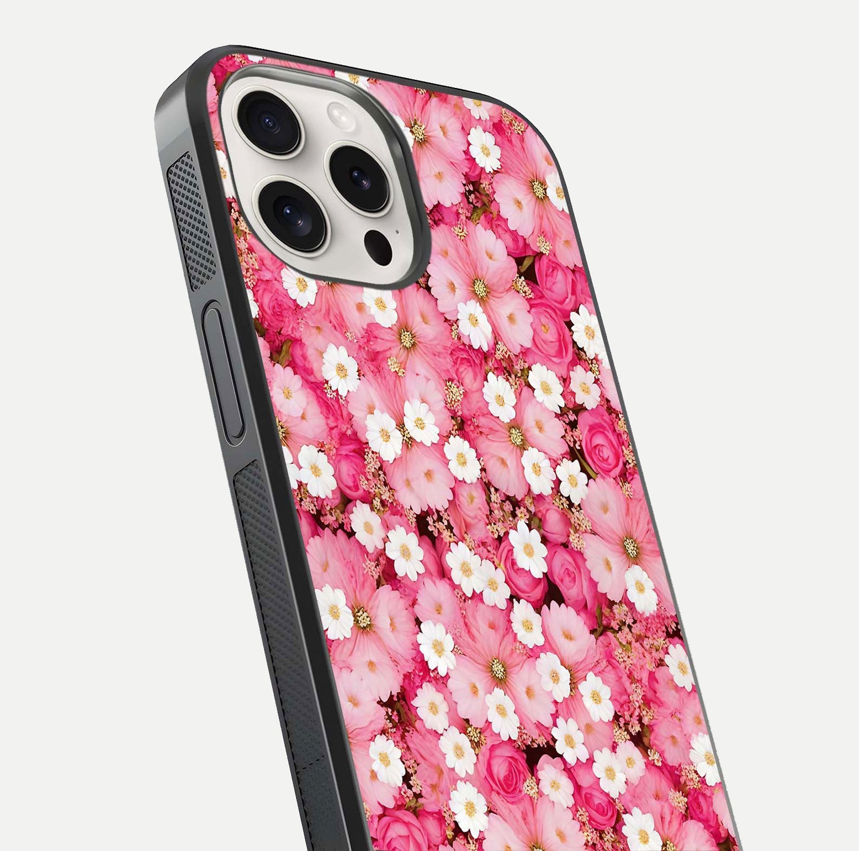 Pink Daisy Bliss Glass Case for iPhone 15 Pro Max close-up angled shot highlighting daisy detail and reflection glow