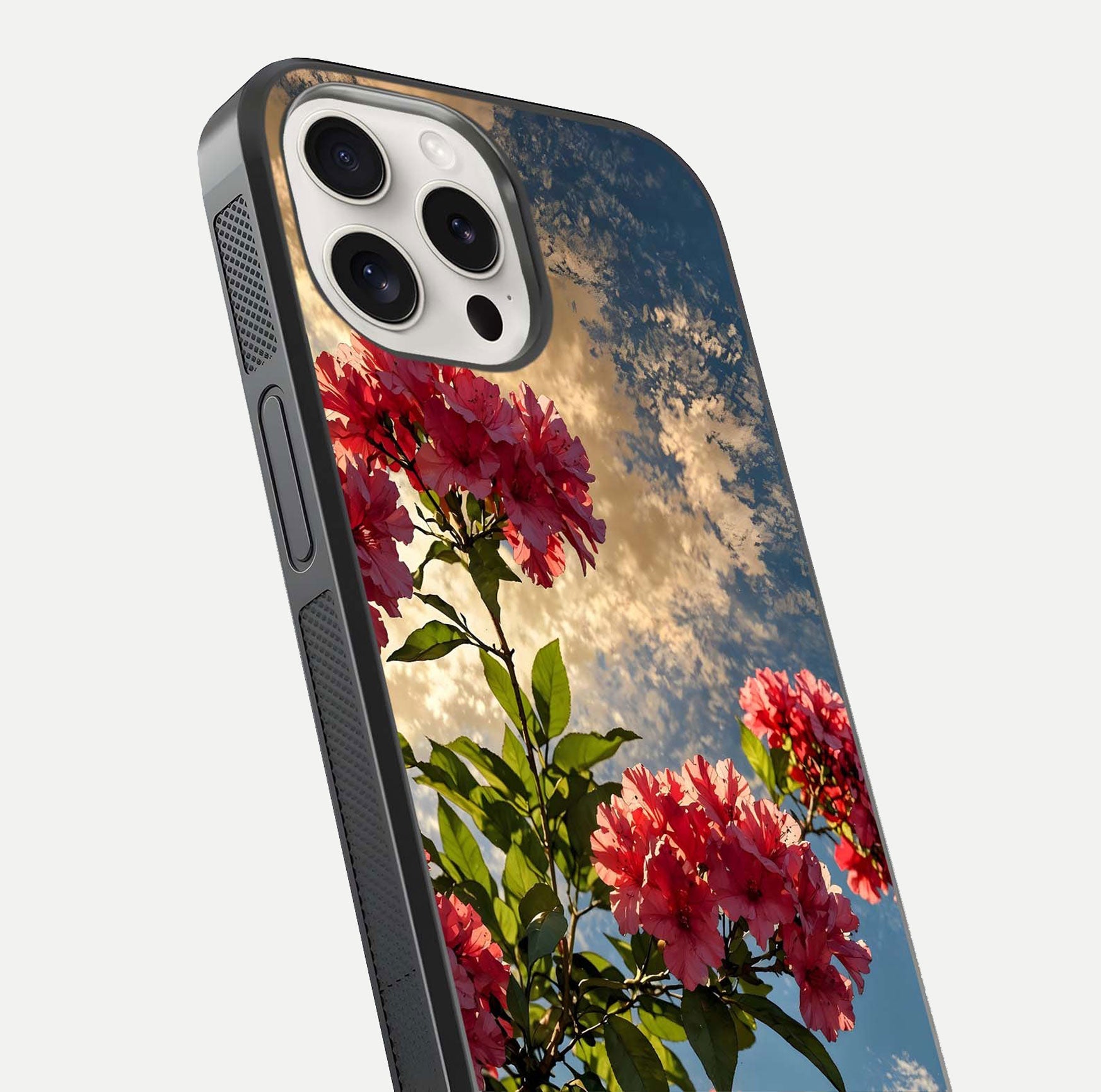 Red Bloom Skies Glass Case for iPhone 15 Pro Max close-up angled shot highlighting detailed blooms and reflection