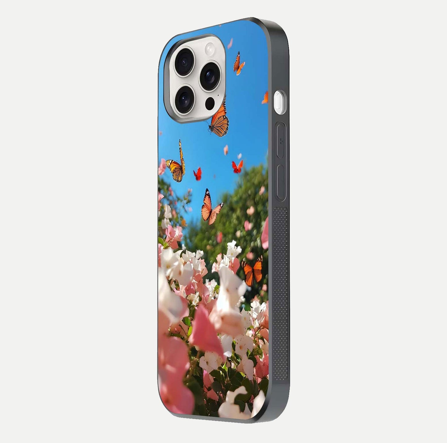 Butterflies in Bloom Sky Glass Case for iPhone 15 Pro Max side-angle image showing delicate details and gloss polish