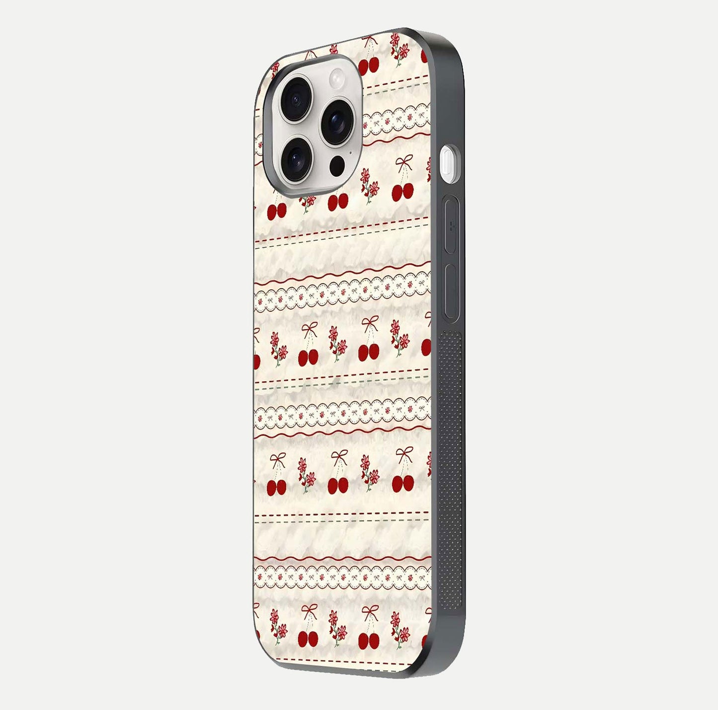 Cherry Bloom Charm Glass Case for iPhone 15 Pro Max side-angle photo showing flower detail and edge light