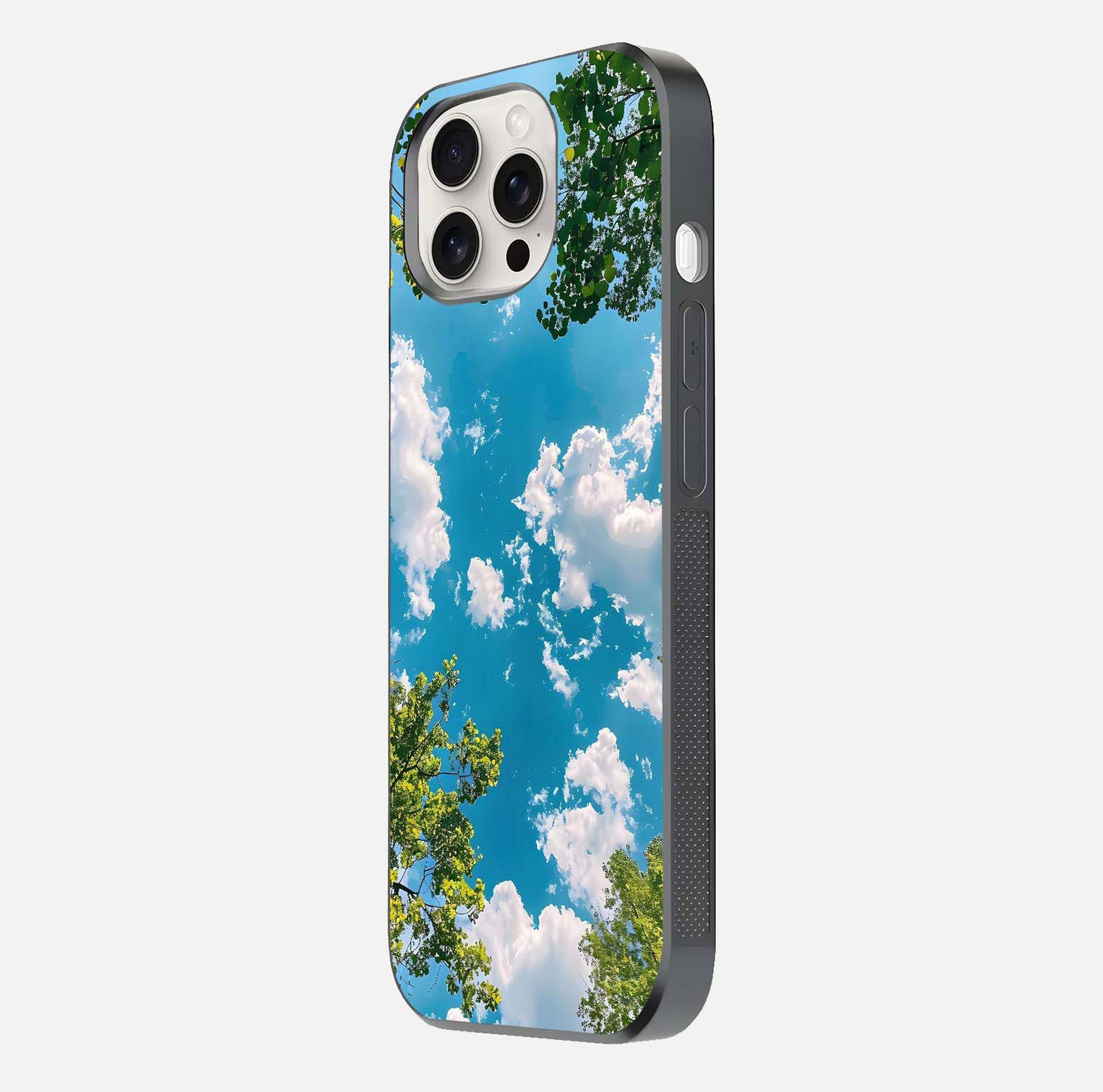 Greenery Sky Glass Case for iPhone 15 Pro Max side-angle image showing reflection glow and nature-themed pattern