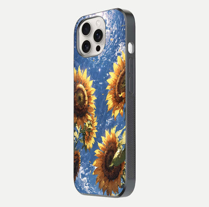 Heavenly Sunflower Rise Glass Case for iPhone 15 Pro Max side-angle image showing reflection glow and soft yellow tone