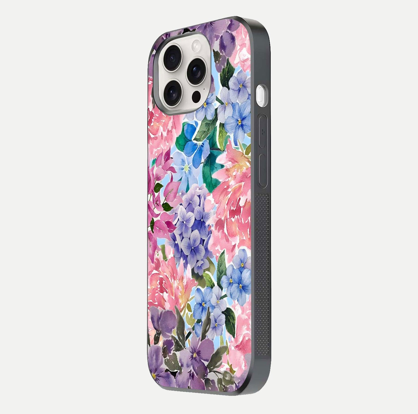 Pastel Floral Mix Glass Case for iPhone 15 Pro Max side-angle image showing reflection and delicate pastel hues