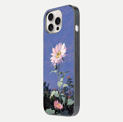 Pink Sunflower Glow Glass Case for iPhone 15 Pro Max side-angle image showing glossy edges and vivid sunflower tones
