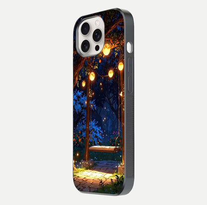 Twilight Garden Swing Glass Case for iPhone 15 Pro Max side-angle image showing reflection, gloss, and scenic depth