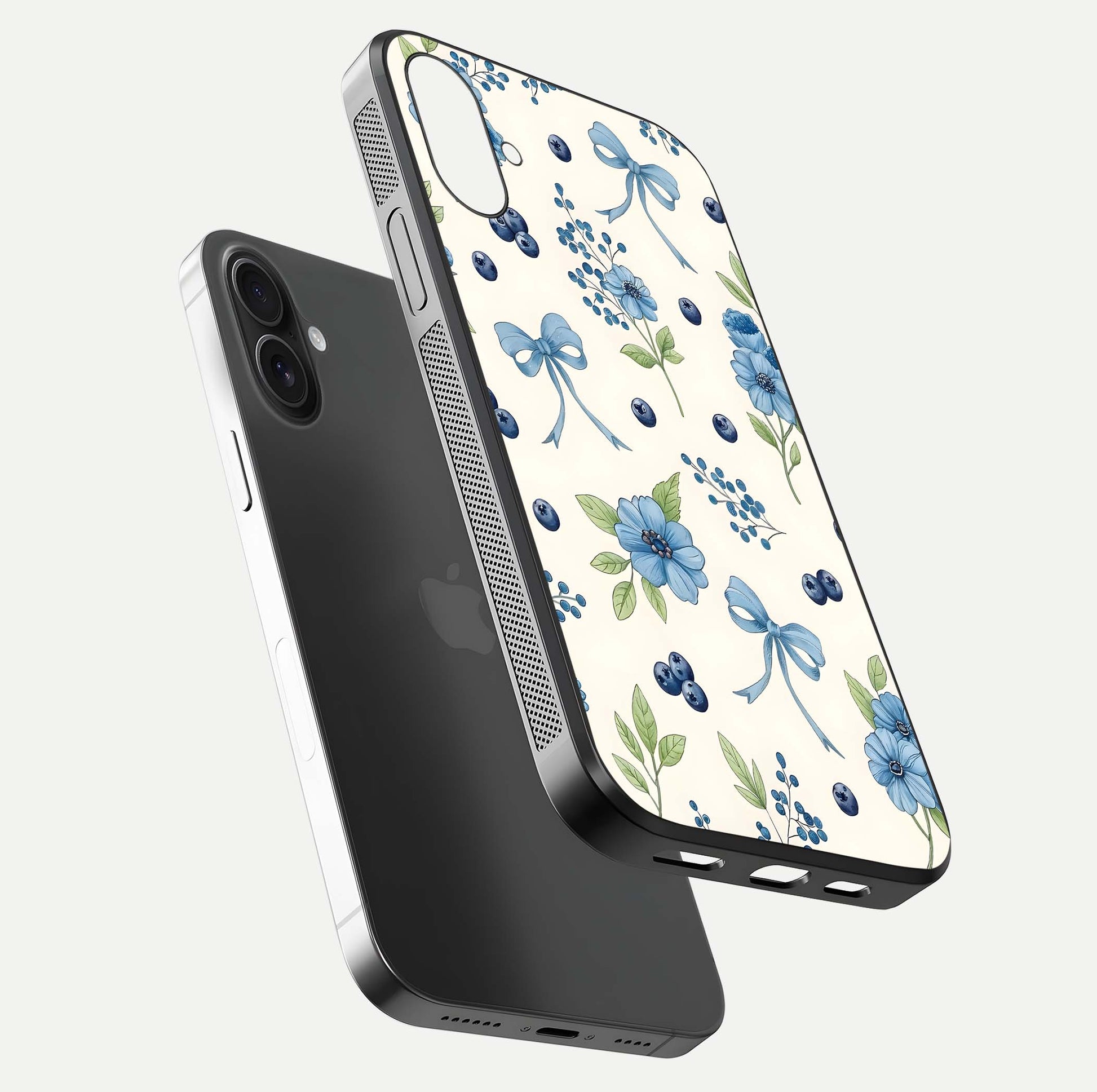 Blue Flower & Bow Glass Case for iPhone 16 floating mockup capturing gloss reflection and girly aesthetic