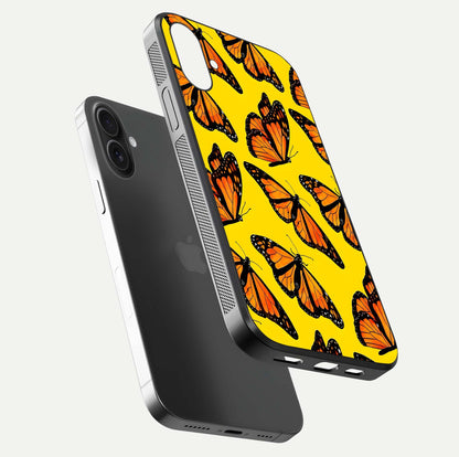 Golden Wing Flight Glass Case for iPhone 16 floating dual-view mockup showing gloss reflection and luxury tone