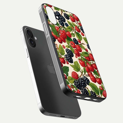 Mixed Berry Collage Glass Case for iPhone 16 floating dual-view mockup showing gloss depth and vibrant design
