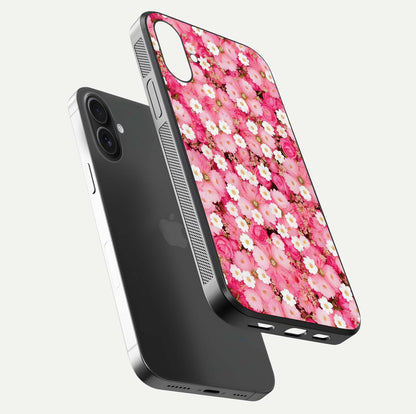 Pink Daisy Bliss Glass Case for iPhone 16 floating dual-view mockup displaying gloss shine and pastel tones