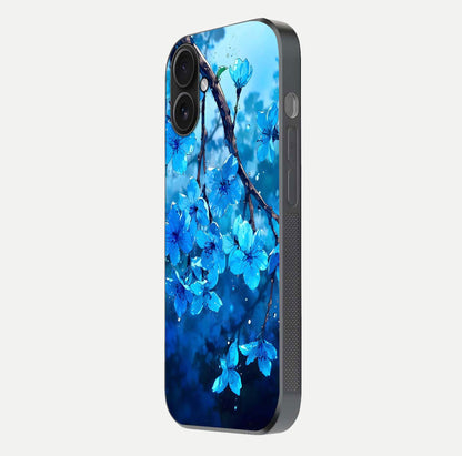 Blue Blossoms Branch Glass Case for iPhone 16 side-angle image showing blossom pattern flow and glossy texture