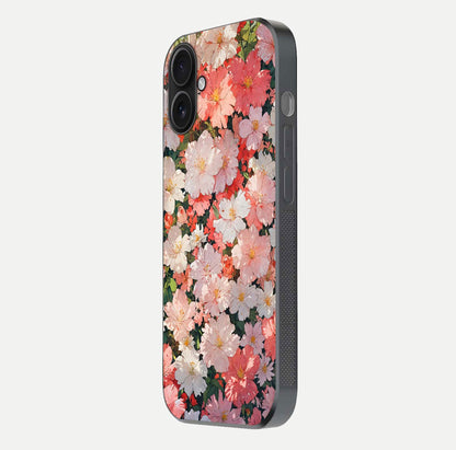 Blush Bloom Field Glass Case for iPhone 16 side-angle image showing petal pattern gloss and smooth edges