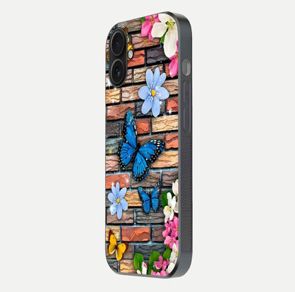 Brick Bloom Flight Glass Case for iPhone 16 side-angle photo showing curve shine and detailed petal contrast