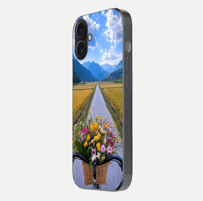 Golden Field Journey Glass Case for iPhone 16 side-angle image showing golden glow, reflection shine, and curved edge