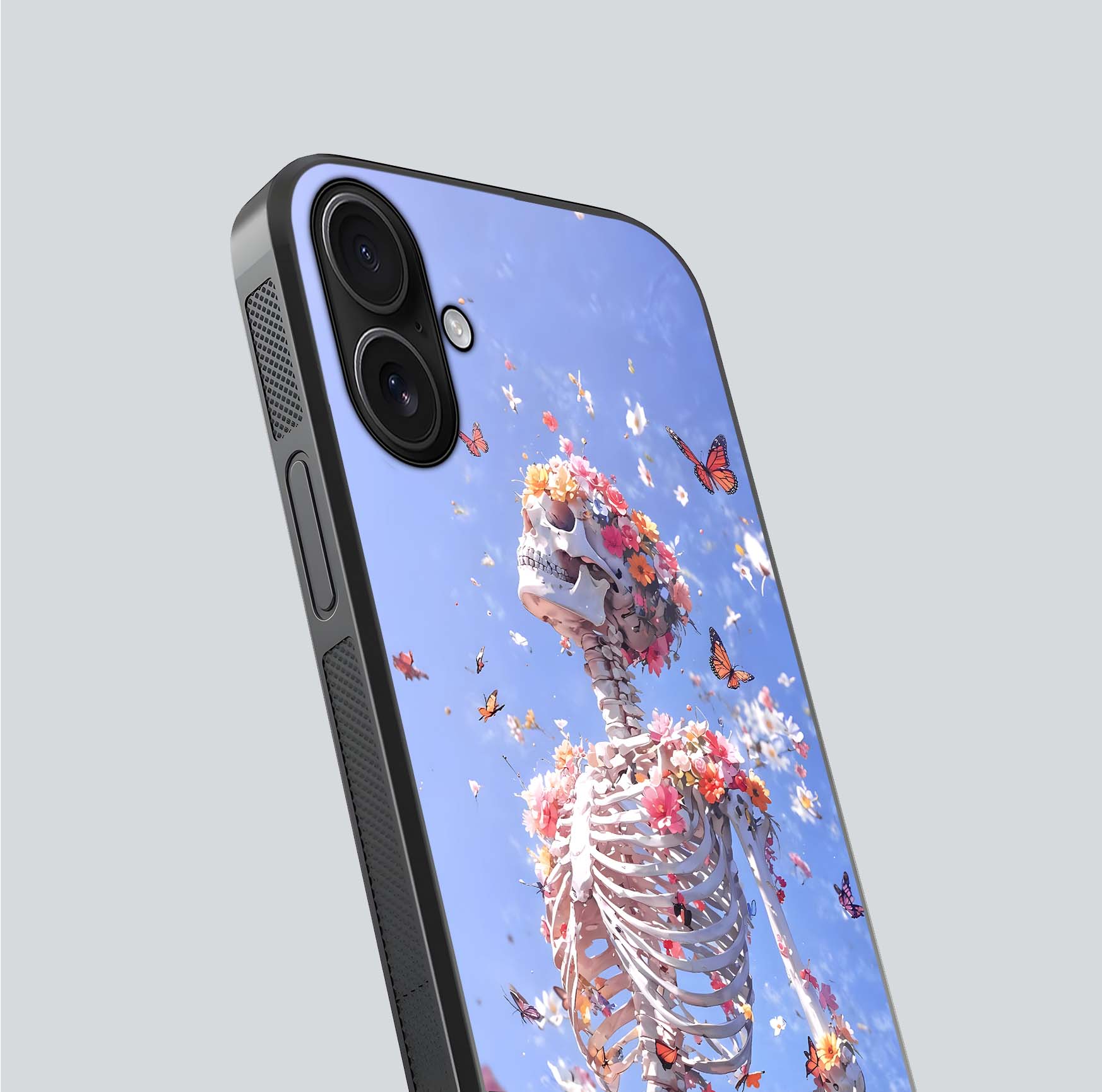Bloom Beyond Bones Glass Case for iPhone 16 close-up highlighting unique bone-floral fusion art and reflection