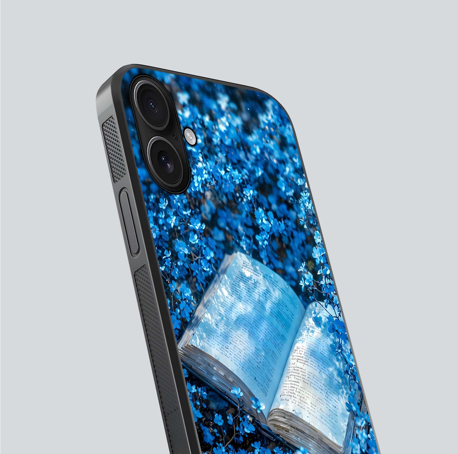 Blue Bloom Tales Glass Case for iPhone 16 close-up angle showing petal texture and blue tone reflection