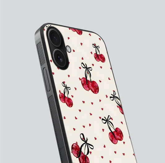 Cherry Heart Bow Glass Case for iPhone 16 close-up highlighting small bows, cherry red tones, and gloss shine