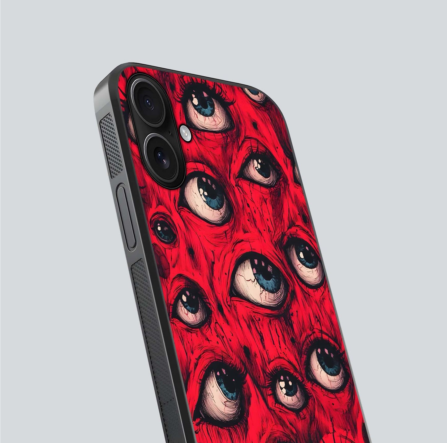 Crimson Watch Eyes Glass Case for iPhone 16 close-up highlighting graphic detail and reflection