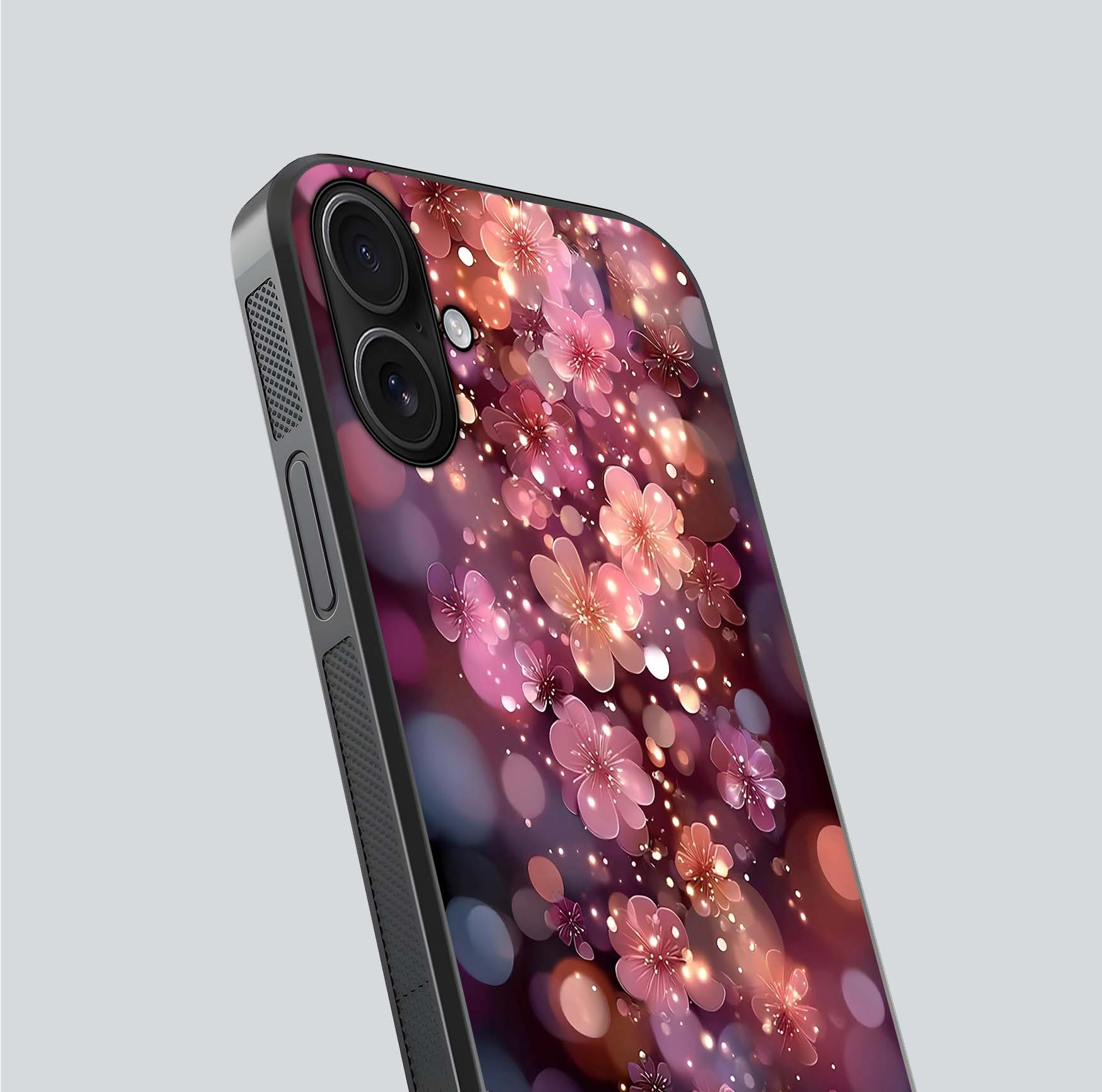 Glowing Petal Bliss Glass Case for iPhone 16 close-up angled shot showing petal glow, color depth, and reflection shine